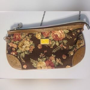 Vintage brown floral handbag with silvertone chain strap. Crossbody